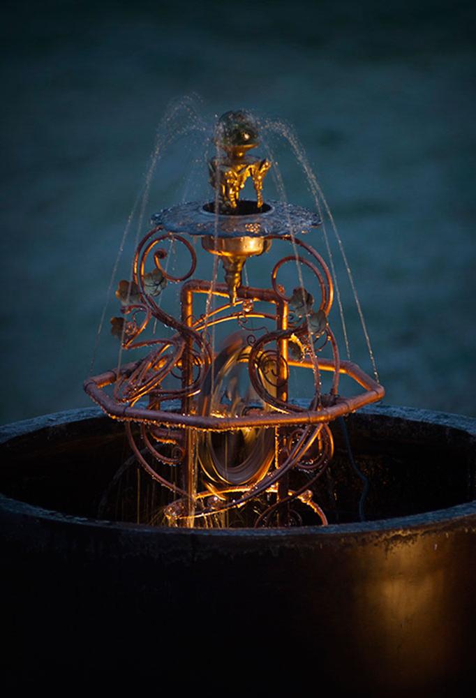  Made from copper tubing, a water wheel and repurposed brass and silver.